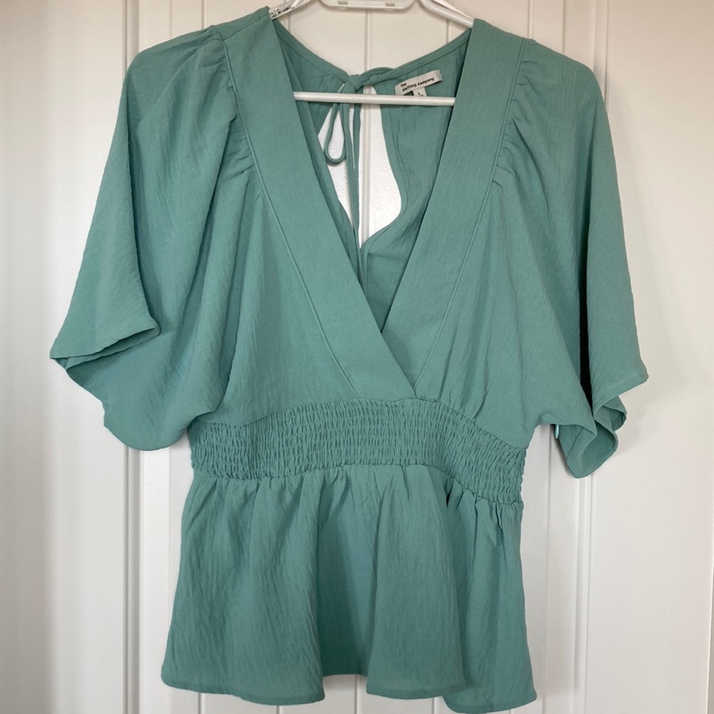 The clothing company boho top. SizeL